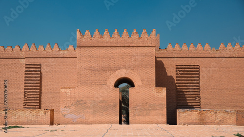 Canvas Print Historic gateway of ancient Babylon showcasing intricate brickwork under clear b