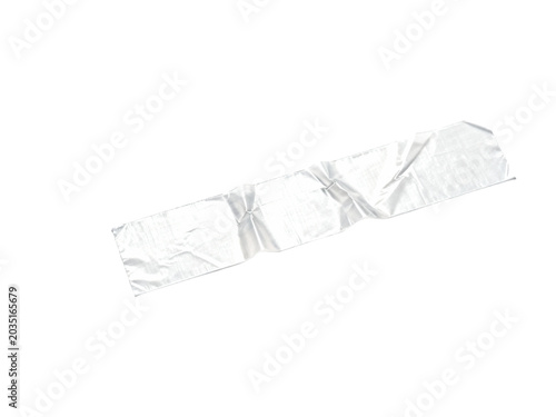 A crumpled piece of silver foil isolated on a white background, showcasing its reflective texture and unique shape