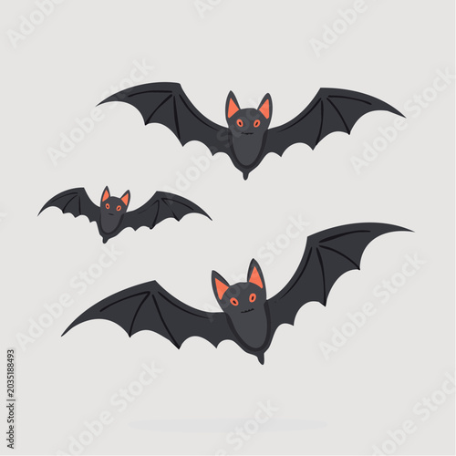 Three Cartoon Bats Flying