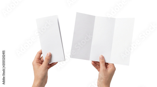 Hands holding blank trifold brochure isolated on transparent background png