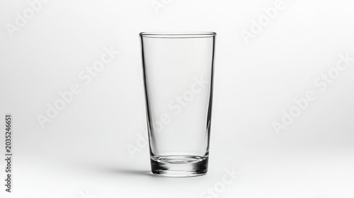Empty pint glass on white background close up side view