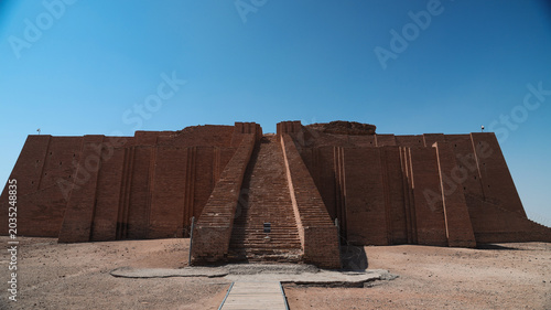 Obraz na plátně Visiting the ancient ziggurat of Ur in Iraq under a clear blue sky during midday