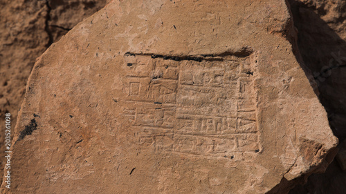 Bild auf Leinwand Ancient cuneiform inscription found in Uruk Iraq revealing Mesopotamian history