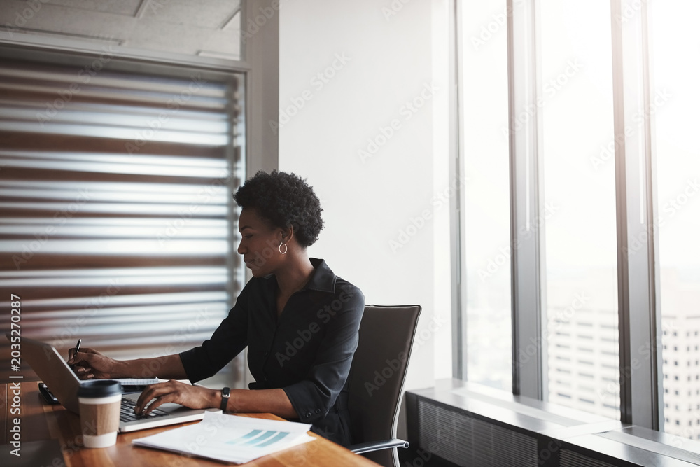 © peopleimages.com - Planning, laptop and typing with business black woman in office for investor report, research and finance. Trading broker, online account review and budget proposal with person for email and audit © peopleimages.com - Planning, laptop and typing with business black woman in office for investor report, research and finance. Trading broker, online account review and budget proposal with person for email and audit