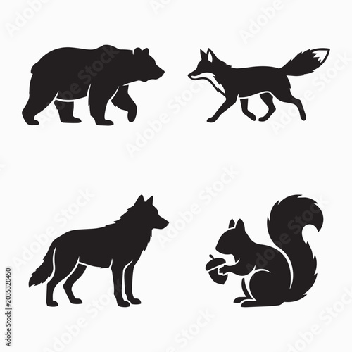 Fotografi Four forest animal silhouettes: bear fox wolf squirrel holding a nut with black
