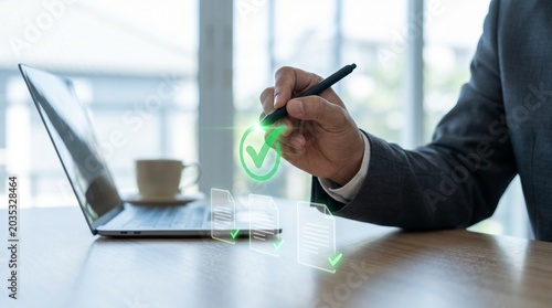 Businessman digitally signing electronic document with e signature on transparent screen