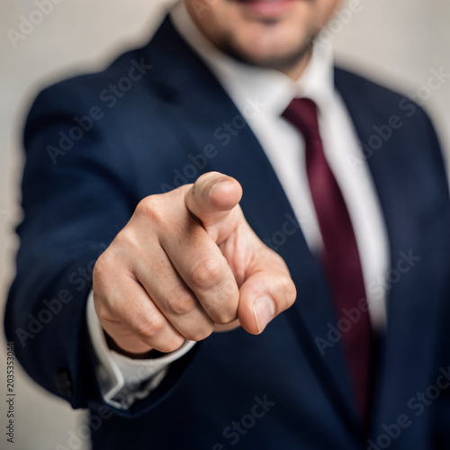 Businessman Pointing Finger Directing or Choosing You