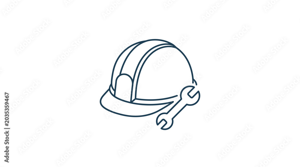 Fototapeta premium A hard hat and wrench lie on a surface in an industrial setting.