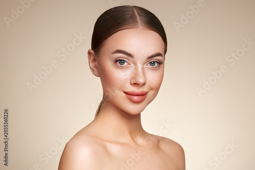 Portrait beautiful young woman with clean fresh skin. Model with healthy skin, close up portrait. Cosmetology, beauty and spa
