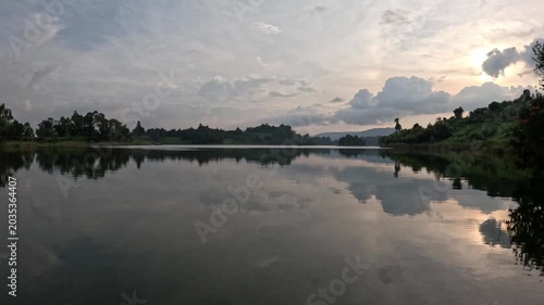 Immersive morning landscape over Lake Bunyonyi Uganda with tranquil water, soft light and atmospheric scenery travel video