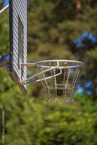 Metal Basketball Hoop on School Playground Back View