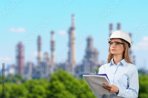 Fotografie Smart male engineer gas refinery service