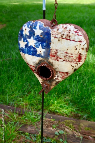 US flag Birdhouse in grass 