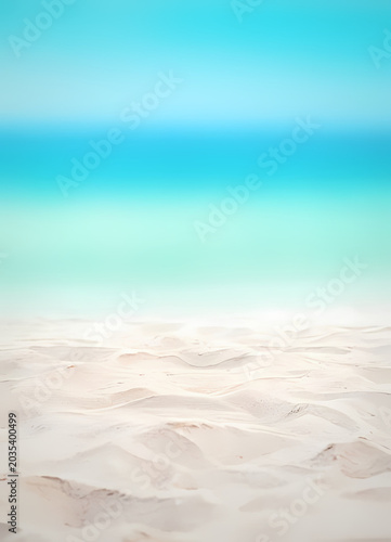 Sunny sandy beach with blue sky ocean waves and tropical summer seascape horizon view