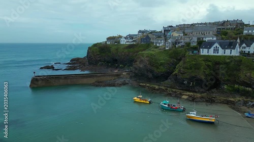Aerial views of the picturesque costal village of Port Isaac on the north coast of Cornwall in the southwest of England.