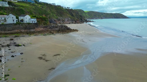 Aerial view of the beach and village of Gorran Haven on the south coast of Cornwall in the southwest of England.