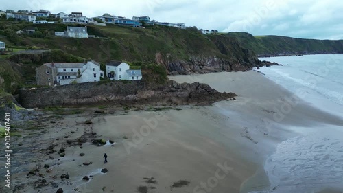 Aerial view of the beach at low tide at Porthluney on the south coast of Cornwall in the southwest of England.