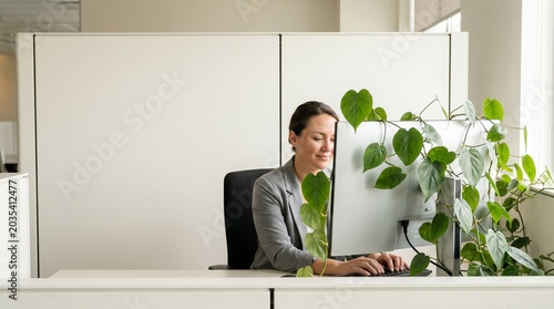 Woman Cradling Head at Desk  Reclaiming Digital Balance