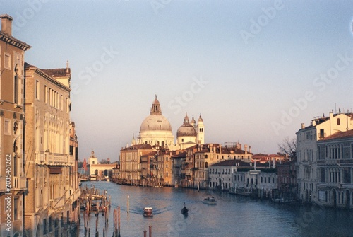 Tableau sur toile Sunset View of Grand Canal and Basilica Santa Maria della Salute in Venice, Ital