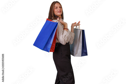 Photos Woman smiling, holding colorful shopping bags after successful retail therapy, e
