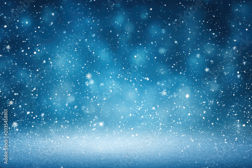 Snow falling on a snowy ground during a magical winter night