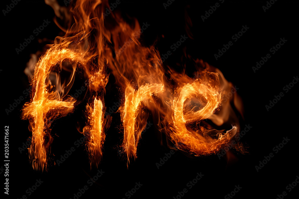 Fototapeta premium Burning fire lettering glowing with bright orange flames on deep black background and dramatic heat effect
