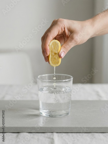 hand holding a lemon. photo