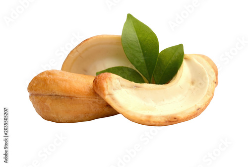 Whole and Split Cashew Nuts with Green Leaves