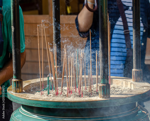 Burning Incense Sticks at Traditional Kyoto Temple