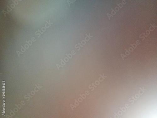 Quadro su tela Abstract background with smooth gradient of warm brown, beige, and soft grey tones, featuring subtle light blur and grainy texture for a minimal aesthetic