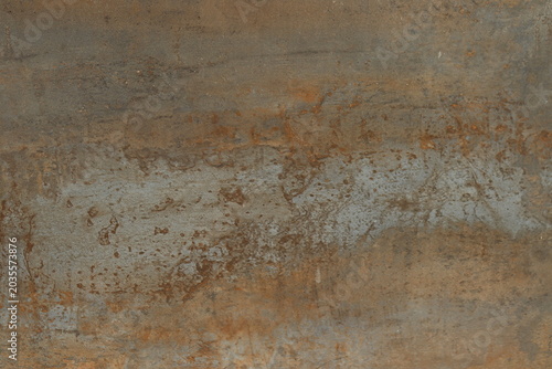 Weathered oxidised metal texture with rust stains and grey bronze patina surface
