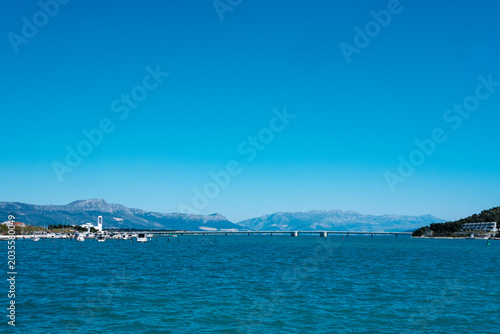 Photos Expansive clear blue sky over the deep blue Adriatic Sea