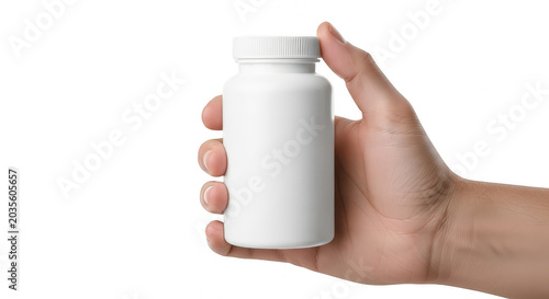 Hand holding white bottle with red liquid isolated on transparent background