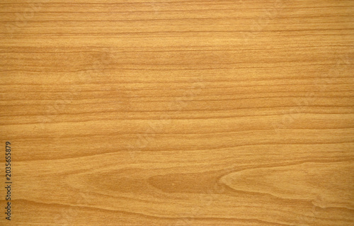 The wooden background is light in color.Film for the ash tree.The texture of the wood is of high quality.