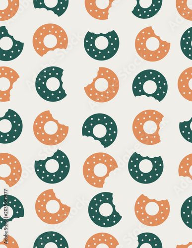 Seamless vector pattern with bitten donuts with sprinkles in terracotta orange and dark teal on a warm cream background.