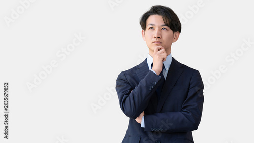 考え事をする男性ビジネスマン, Thoughtful Businessman