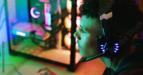 Obraz na plátně Headphones, teen and profile for gaming in home, entertainment and esports with RGB light