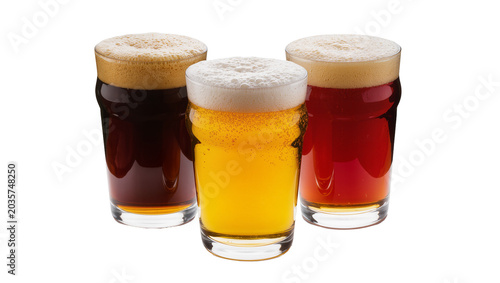 Tableau sur toile Isolated three different beers in glasses, a dark stout, a golden lager, and a red ale with foam