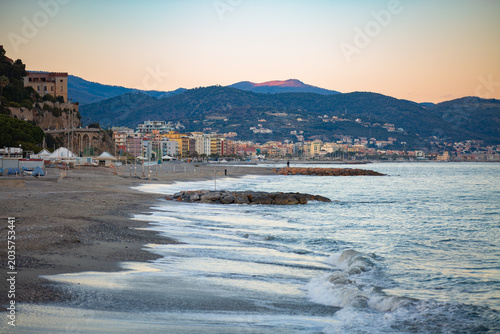 Panoramic sunset view of the village of Ceriale on the eastern Ligurian coast, Liguria, province of Savona. Splendid view of the sea and the village of Ceriale with its colorful buildings.