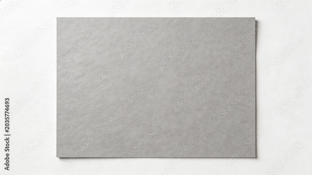 Fototapeta premium Gray textured paper on white background
