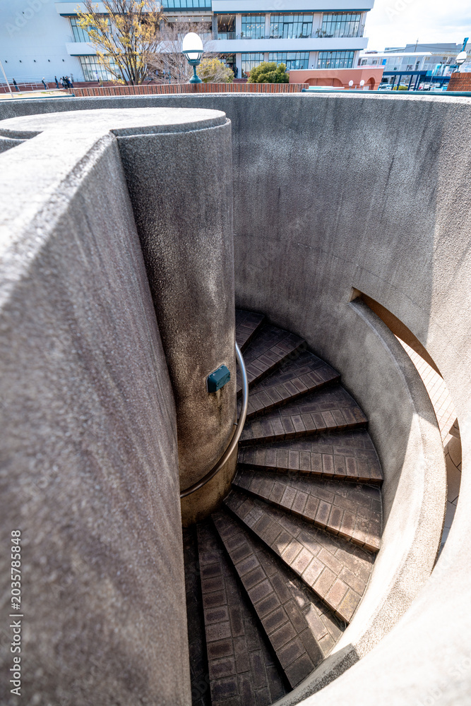 Obraz premium Shimizu, Japan - March 27, 2026: Concrete spiral staircase on the docks of Shimizu in Shizuoka, Japan
