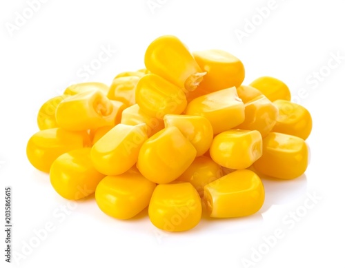 Bright Yellow Corn Kernels Piled on White Background