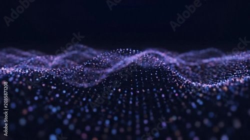 Abstract glowing particles in undulating waves, dark background, futuristic digital motion background