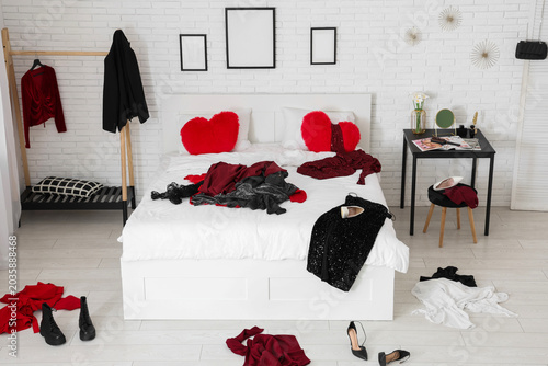 Interior of messy bedroom w...
