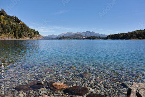 Photos Crystal Clear Lake Water and Mountain Landscape in Patagonia