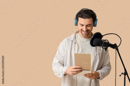 Male radio presenter with n...