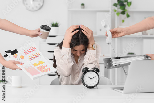 Stressed businesswoman with...