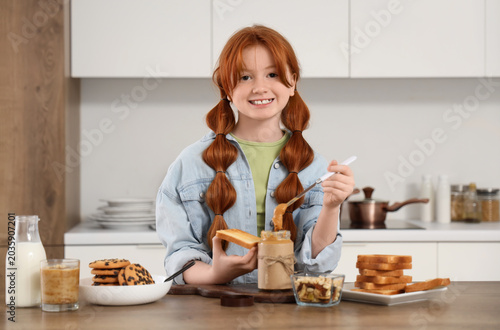 Teenage redhead girl with t...