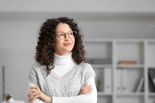 Young woman looking upwards...