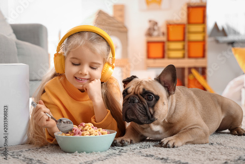 Cute happy little girl in h...